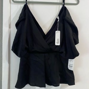 Black drapey blouse with zipper side, open shoulders and tie waist